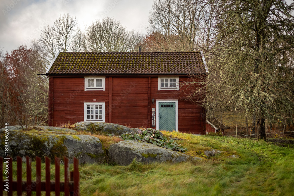 Obraz premium Old red Swedish farmhouse