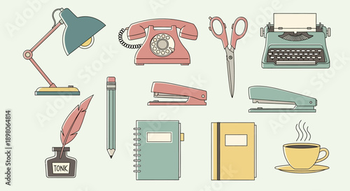 Collection of vintage office supplies, including a typewriter, phone, and lamp, displayed together.