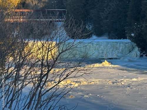 Golden Hour Glow on a Winter River Landscape,  snow fall wallpaper