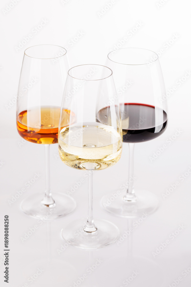 Obraz premium Different wine glasses on white background