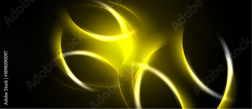 Bright yellow swirls dominate black background. Flowing lines create abstract, luminous design. Soft glow radiates from center.