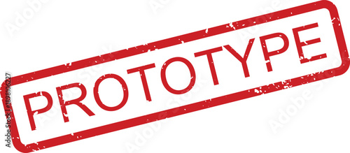 A prominent red rubber stamp impression clearly displays the important word PROTOTYPE on a clean white background