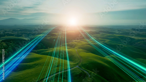 Fotografie A path of light stretching towards the sunrise in nature - A path to the future
