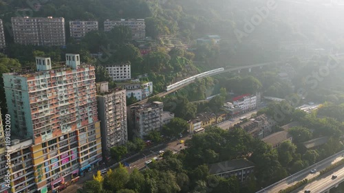Monorail Transit Train Passing Through Liziba Station In Chongqing, China. Aerial Shot