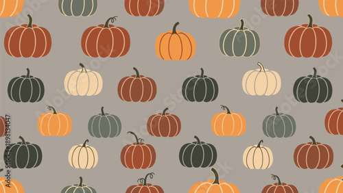 Seasonal seamless pattern showcasing pumpkins in various sizes and earth tones like orange, beige, and dark green on grey.