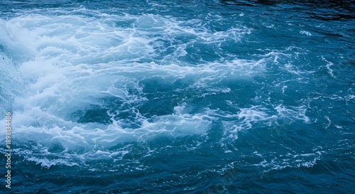 Wallpaper Mural Turbulent blue ocean waves with white foam and swirling water patterns Torontodigital.ca