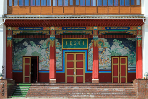 Painted walls and red doors of a Buddhist temple