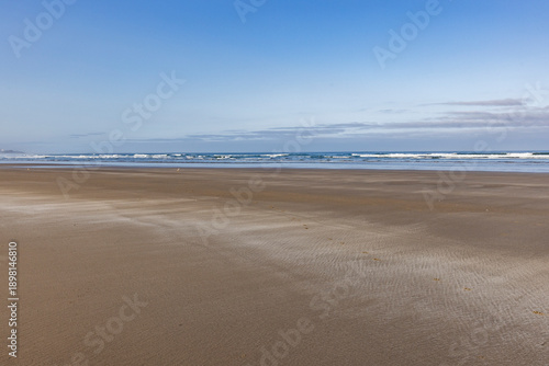USA, Oregon, Newport, Blue sky over empty Oregon beach