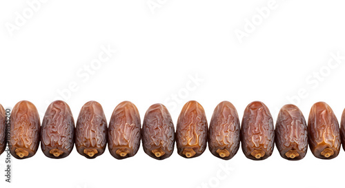 A row of brown dates lines the bottom edge of the frame.