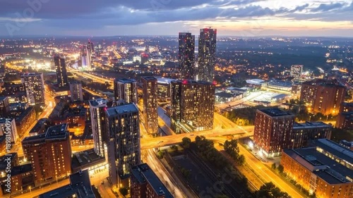 Wallpaper Mural Aerial view of a modern city skyline at night with illuminated buildings and roads. Torontodigital.ca