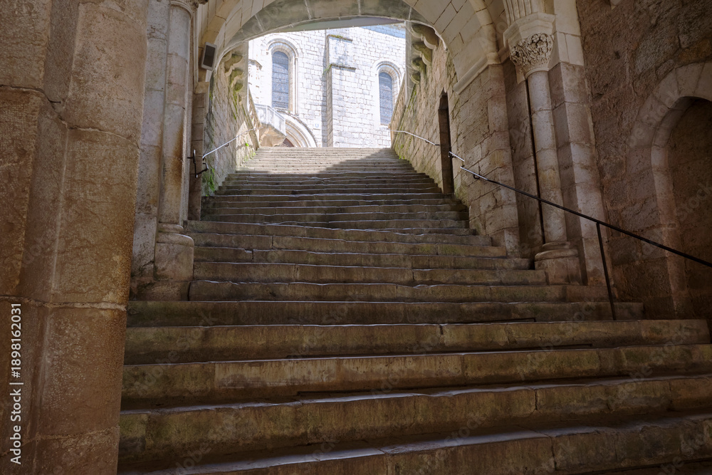 Obraz premium Large stone staircase in the city of Rocamadour Lot Occitanie in Southern France in summer. The city was founded in the early middle ages by the hermit Amadour.
