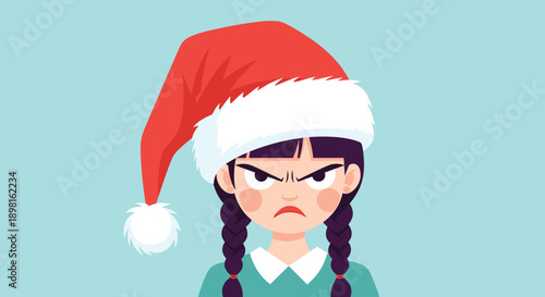 Angry young girl with dark braids wearing a red and white Santa Claus hat against a light blue background for festive emotion concepts.