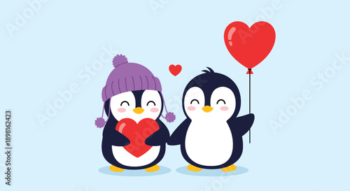 Pair of cute cartoon penguins in love hold a red heart and a heart balloon against a soft light blue winter background.