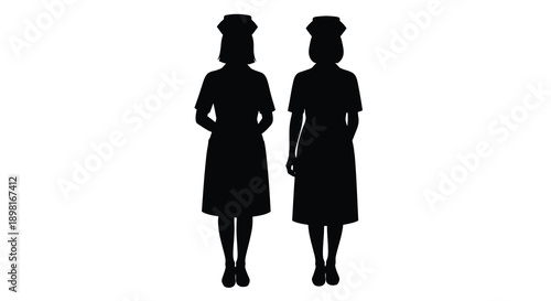 Two nurses standing side by side in uniform a striking silhouette