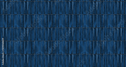 Seamless vertical glossy blue ceramic tiles with wavy glaze surface and reflective highlights © MonTeArt