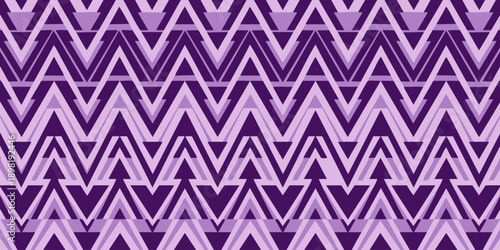Geometric pattern of zigzag shapes in various shades of purple, creating a dynamic and modern design