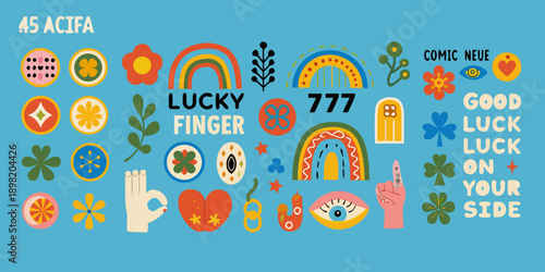 Collection of colorful whimsical good luck charms and symbols arranged on teal