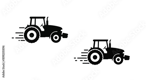 Two black tractors moving quickly depicted in a stark silhouette