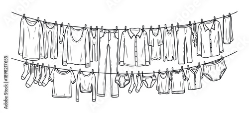 Collection of garments and personal apparel items drying on a clothesline with clothespins illustrating daily chores and domestic life concepts.