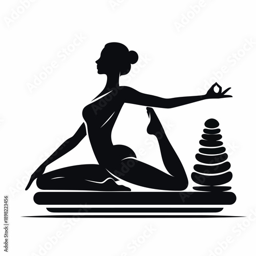 Elegant yoga pose on a decorative cushion with a balancing tower