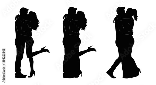Silhouettes of couples embracing in a romantic intimate dance pose

