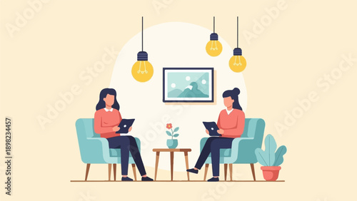 Two people sitting in armchairs, each looking at a tablet