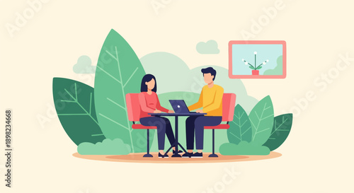 Two people sitting at a table, using a laptop, surrounded by large green leaves