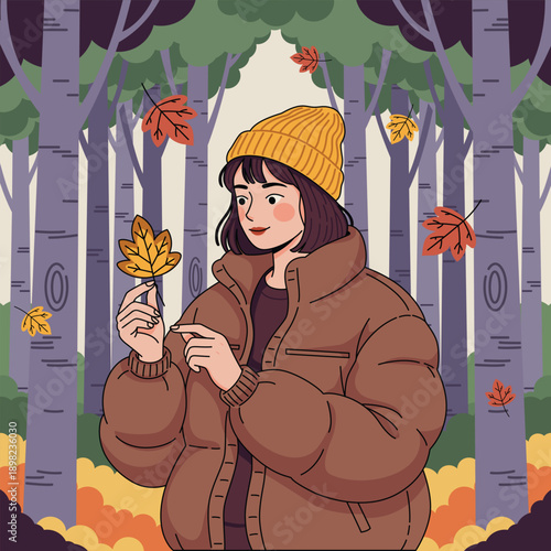 Warm and cozy flat vector illustration of a young woman wearing a beanie and puffer jacket while holding a yellow autumn leaf in a peaceful forest