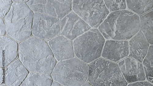Slika na platnu Natural grey stamped concrete or stone texture with a random flagstone pattern