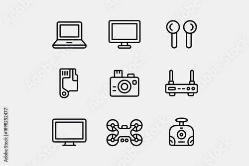 Technology gadgets set including laptop, monitor, earphones, camera