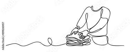 Minimalist continuous line drawing of a person diligently folding laundry, creating a neat stack of garments, perfect for home organization themes and household chore visuals