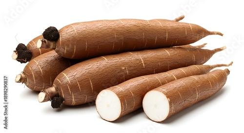 Fresh Brown Root Vegetables Sliced and Whole on White Surface