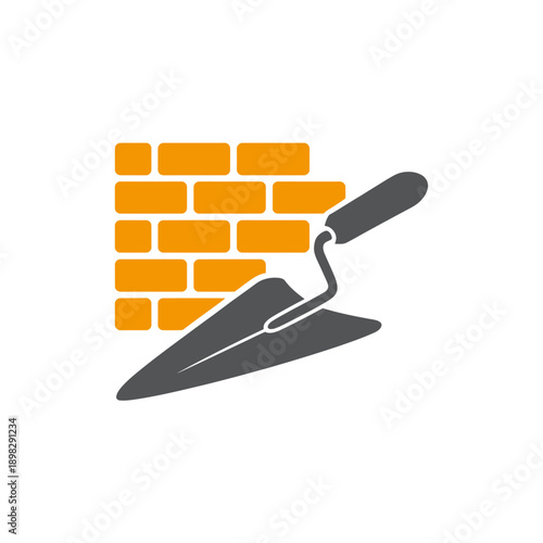 Trowel and brick wall construction tool icon graphic symbol