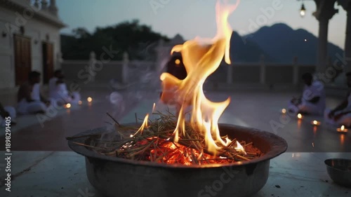 Hindu Fire Ritual Agni Hotra Ceremony with Priest Worshippers in Traditional Attire