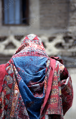 Woman in veil shopping at the market in Yemen's capital, Sana'a
