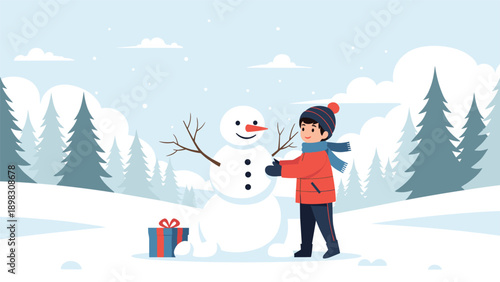 Young boy in winter clothing happily building snowman in snowy forest landscape with blue gift box on the ground.