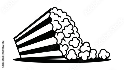 A vibrant visual of fresh popcorn tumbling out of a classic striped container, ready for movie night enjoyment.