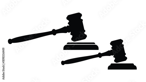 Black gavel and sounding block display a legal symbol silhouette