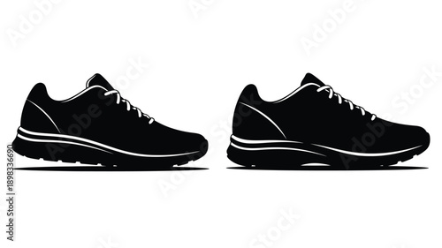 Pair of athletic shoes depicted in a stark black silhouette
