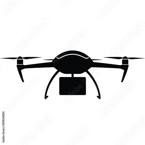 A quadcopter drone with mounted camera flying in an open space