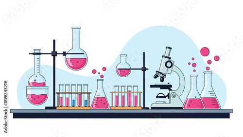 Scientific research laboratory setting with various glass flasks, test tubes, chemicals, and a modern microscope.
