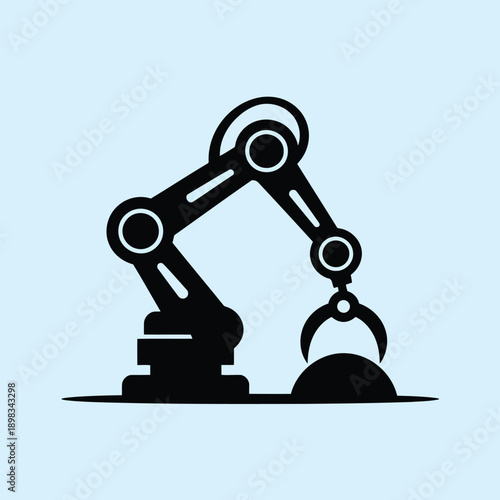 Industrial robotic arm lifting a heavy block in a manufacturing setting