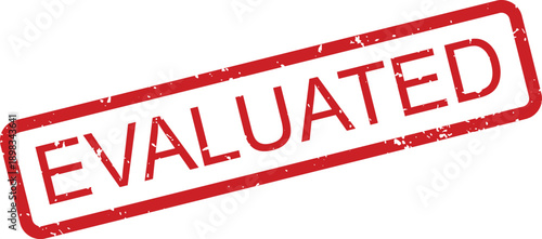 A vibrant red grunge rubber stamp displaying the important word EVALUATED on a pristine white surface
