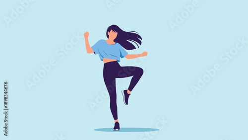 Young woman with long dark hair dancing or performing aerobic exercises in a blue top and black leggings on light blue background.