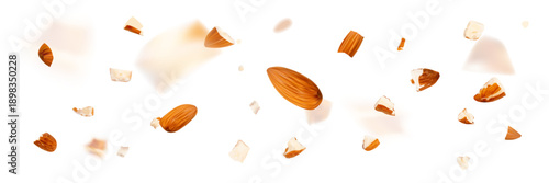 Crushed almonds falling isolated, flying nut pieces, levitate scattered almond seeds