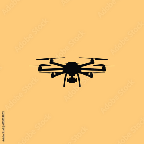A sleek quadcopter drone flying against a plain background