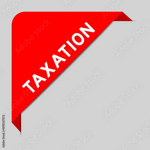 Red color of corner label banner with wor taxation on gray background