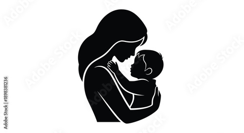 A mother tenderly holding her baby a dark silhouette