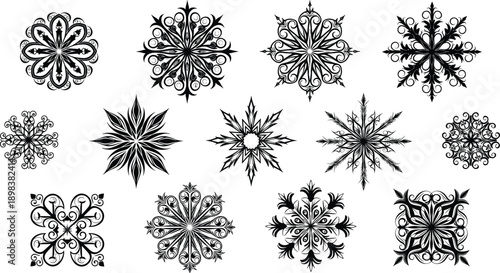 Collection of intricate snowflake silhouettes and decorative mandala ornaments isolated on white background for winter holiday season and Christmas card design