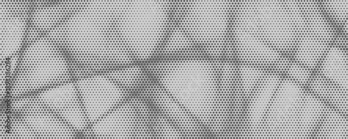 Abstract halftone background made of dense hexagonal dot patterns creating soft organic shapes and layered tonal variations on a gray surface.